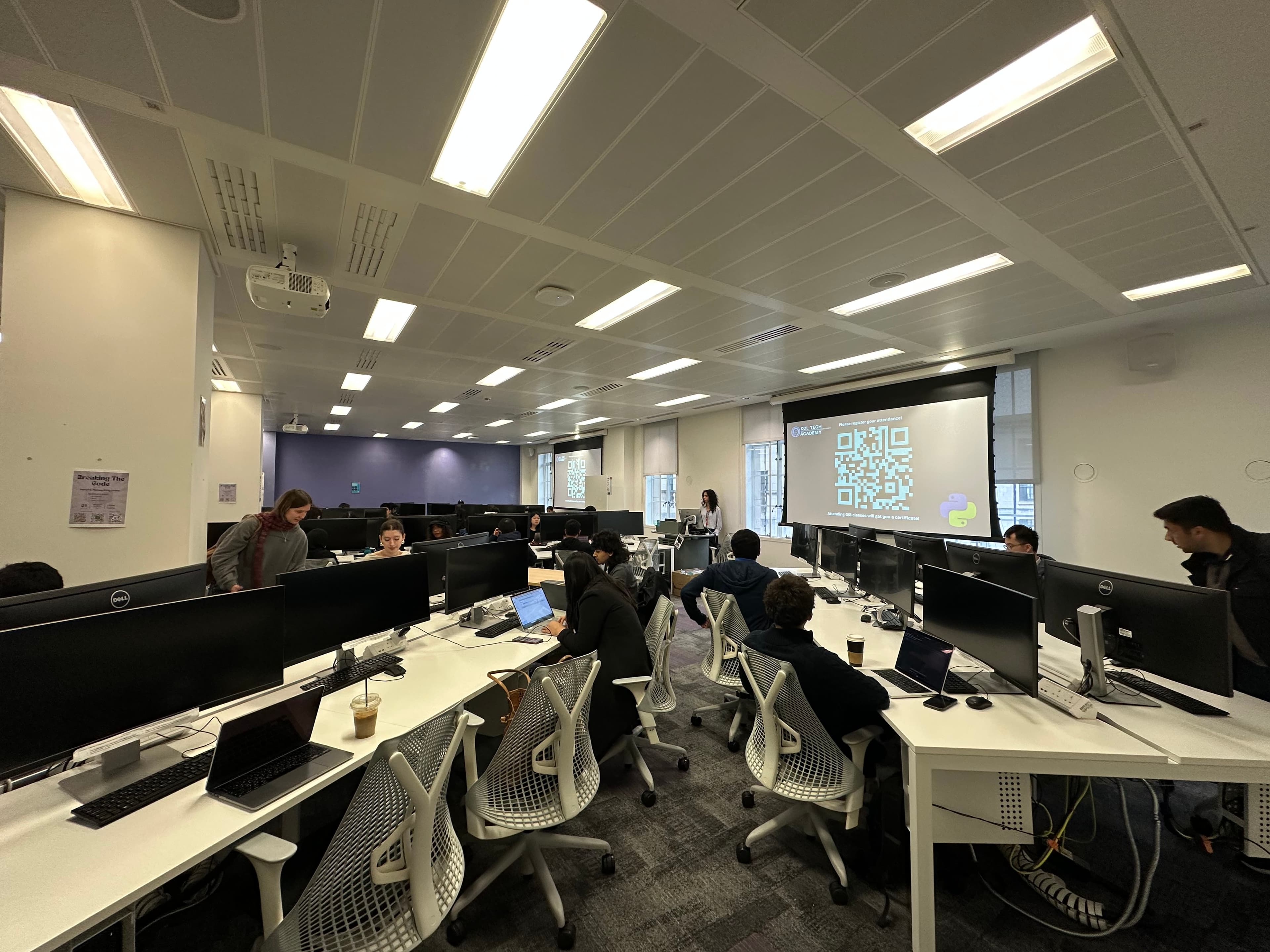 Students working on laptops during a KCL Tech workshop